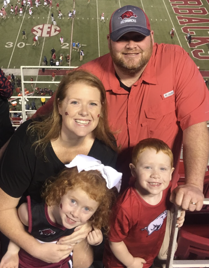 Molly Heath and her family at a Razorback football game.